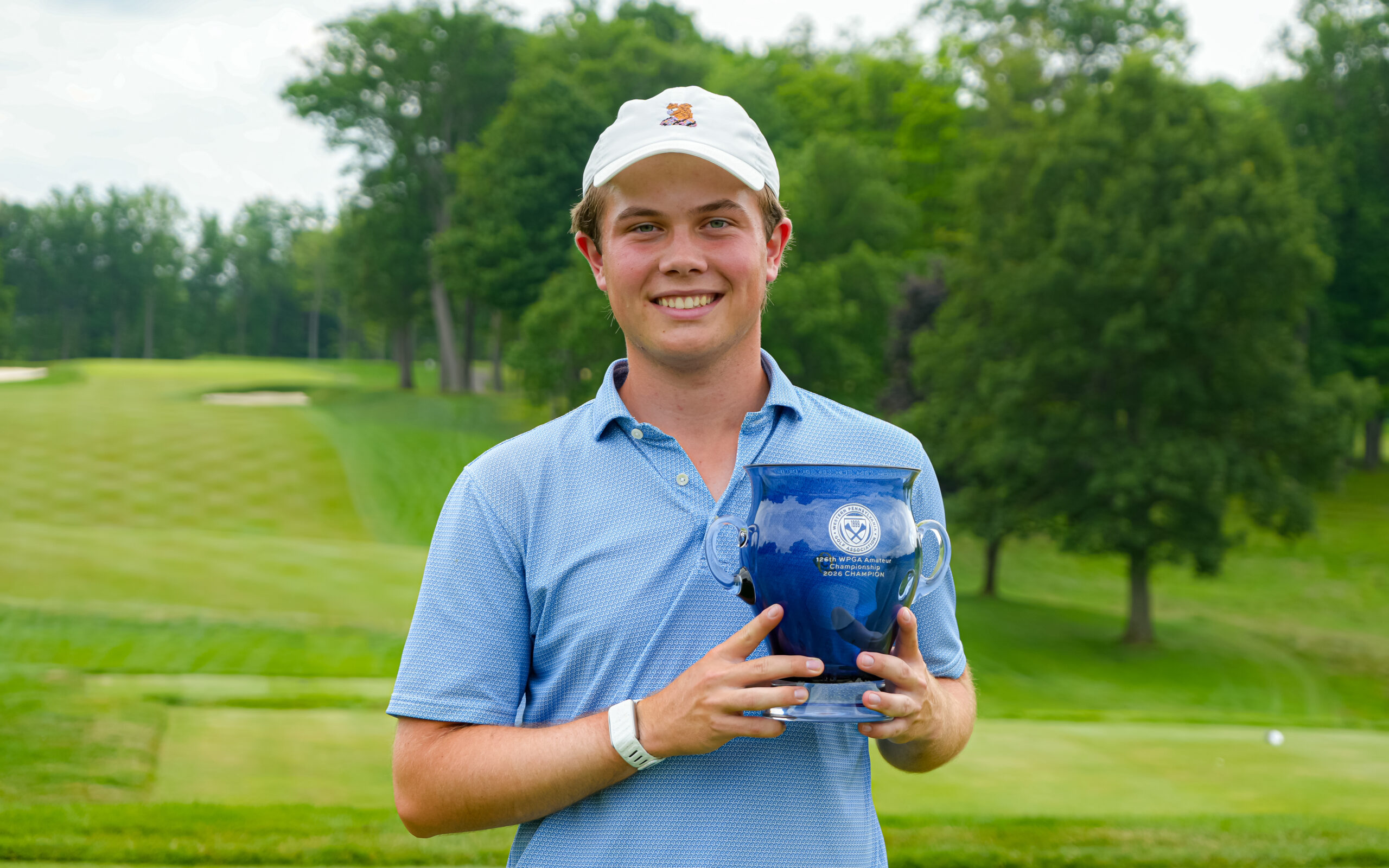 Carson Kittsley with WPGA Amateur Championship trophy