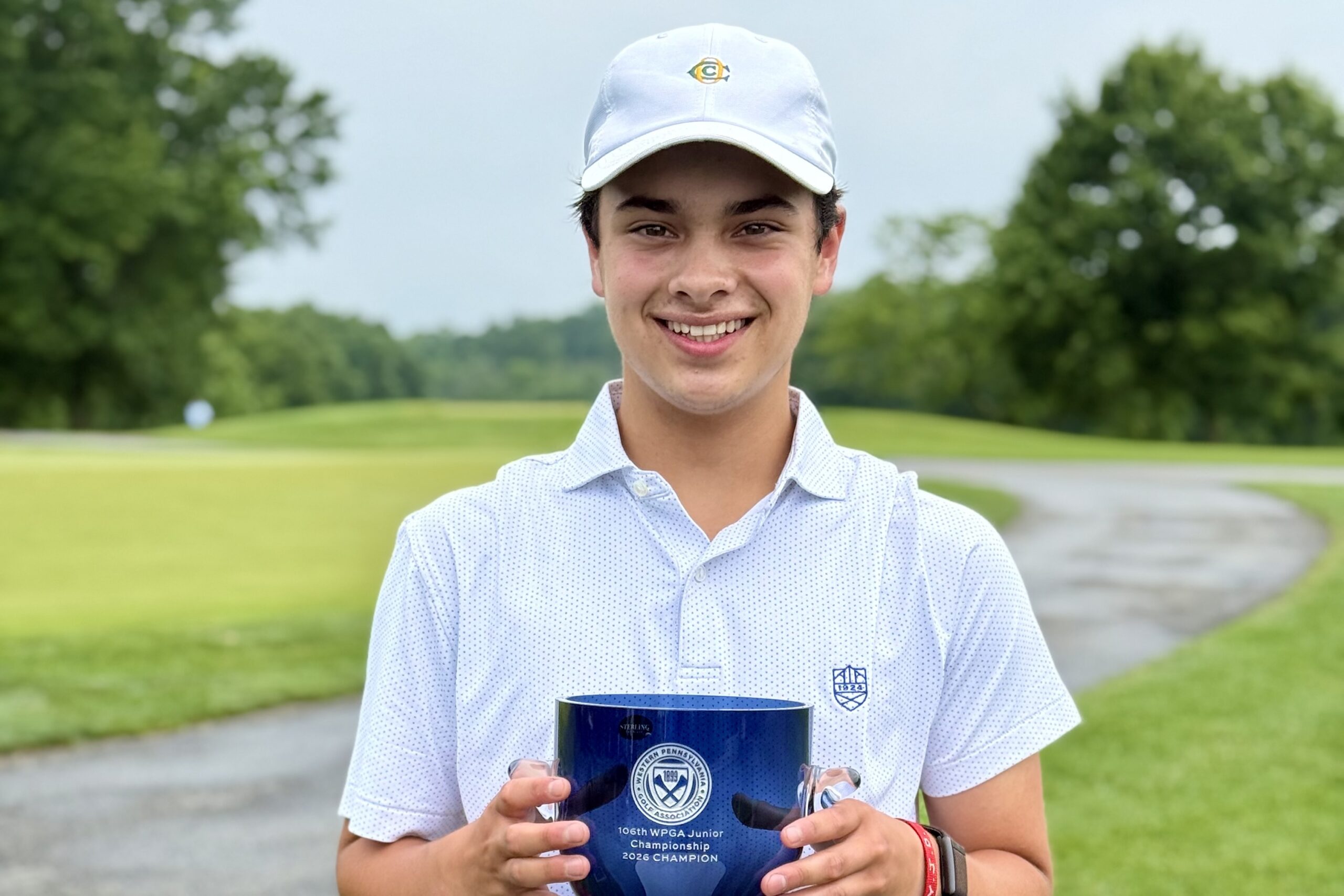 Camden Reyes with WPGA Junior Championship trophy
