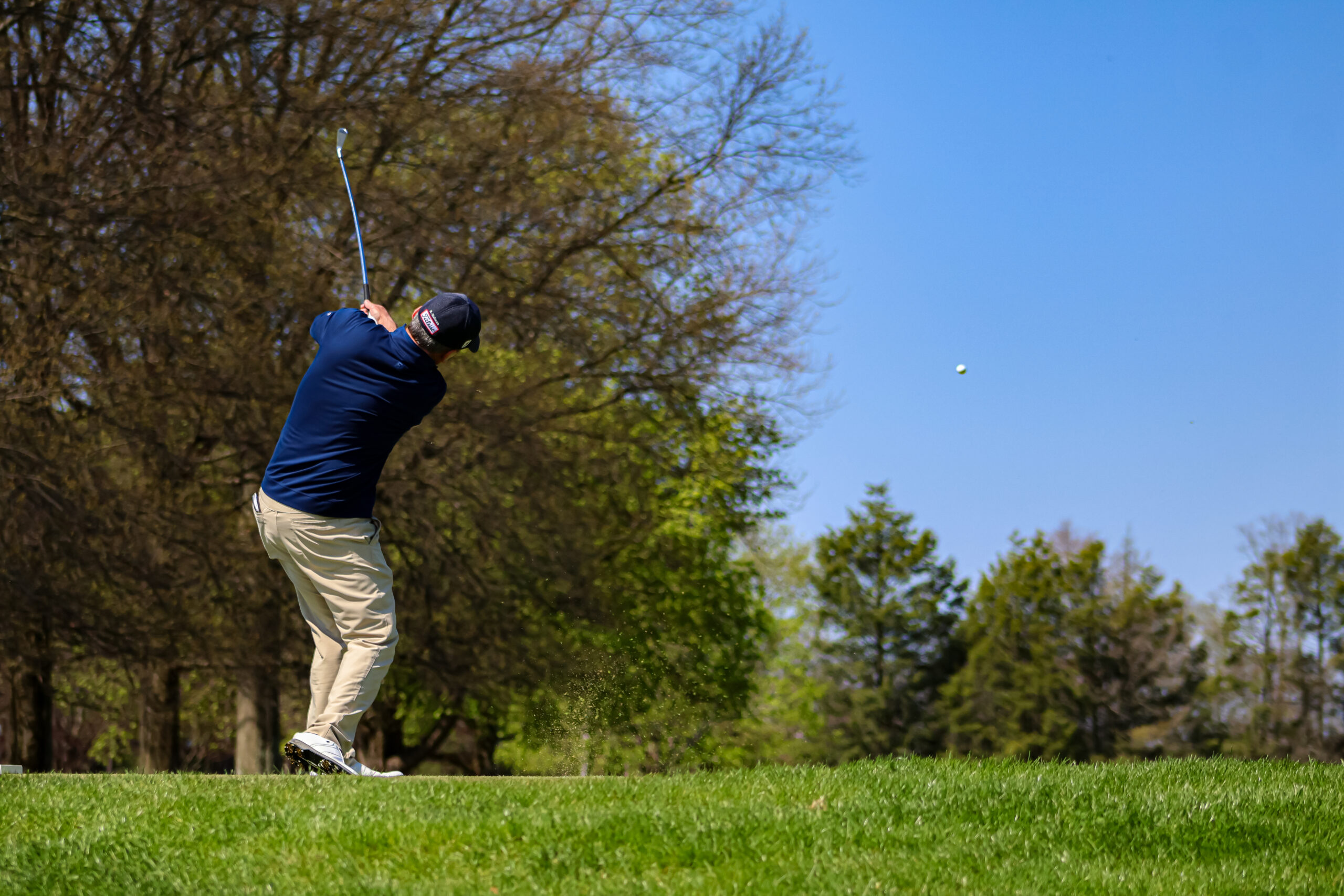 A golfer hits a shot at Indiana Country Club