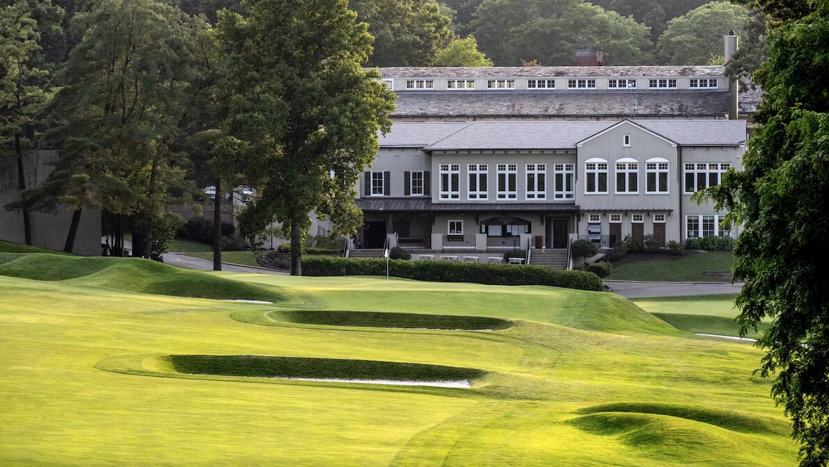 The 12th green and clubhouse at Fox Chapel Golf Club, host of the 2024 WPGA U.S. Senior Women's Open Championship