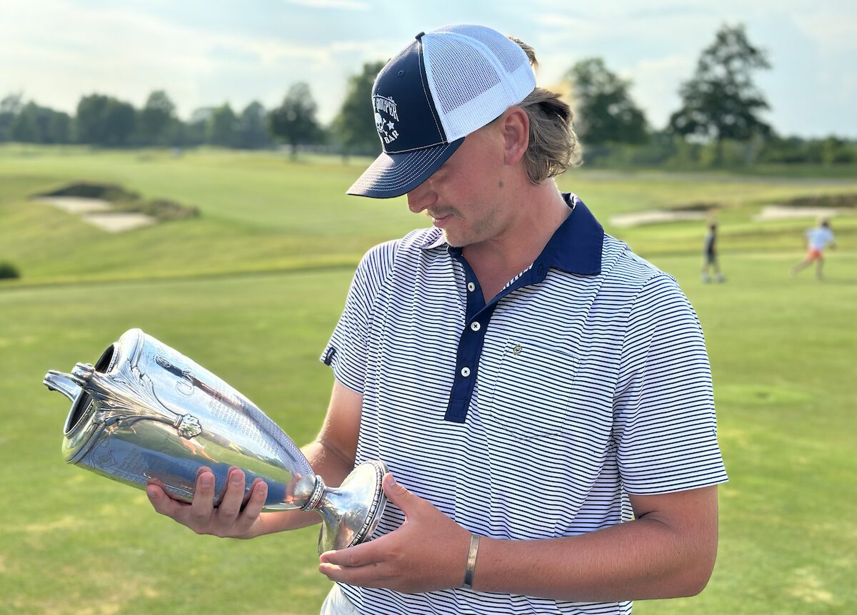 Nathan Piatt with the W.C. Fownes Trophy