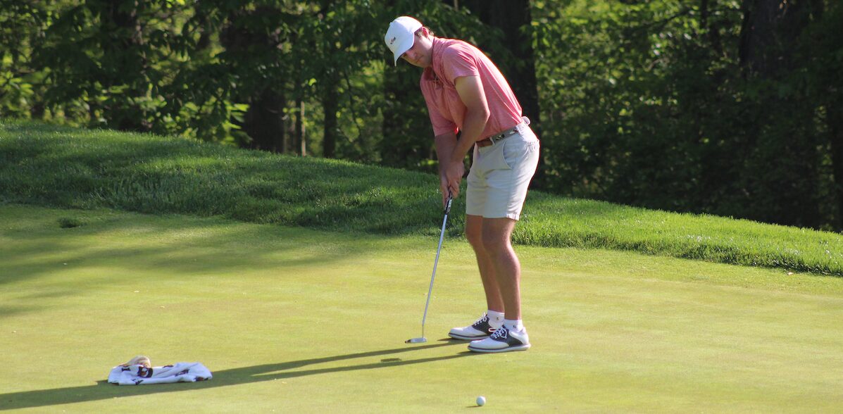 Tanner Johnson holing the winning putt in the 30th WPGA Spring Stroke Play Championship at Nemacolin Country Club