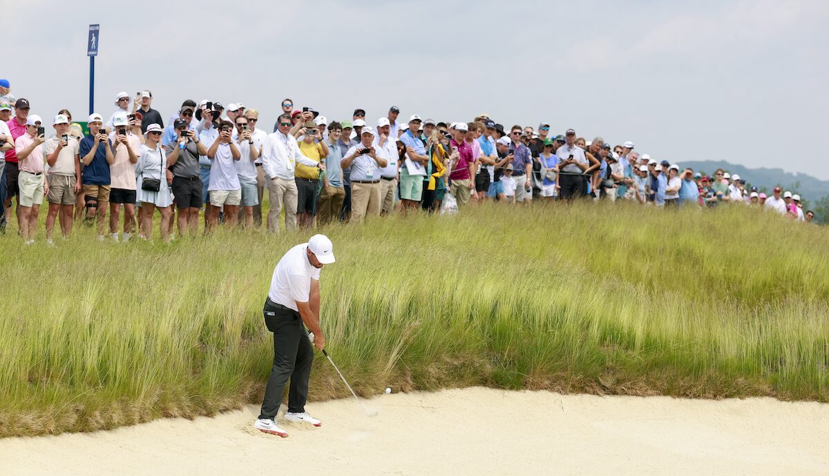 Scottie Scheffler hits a bunker shot during a practice round ahead of the 2025 U.S. Open at Oakmont Country Club in Oakmont, Pa. on Monday, June 9. Photo courtesy of Jason E. Miczek/USGA