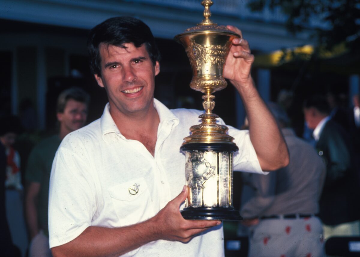 Jay Sigel holding the trophy aft3er winning the 1983 U.S. Amateur Championship at North South CC in Glenview, Ill. Photo courtesy of the USGA.